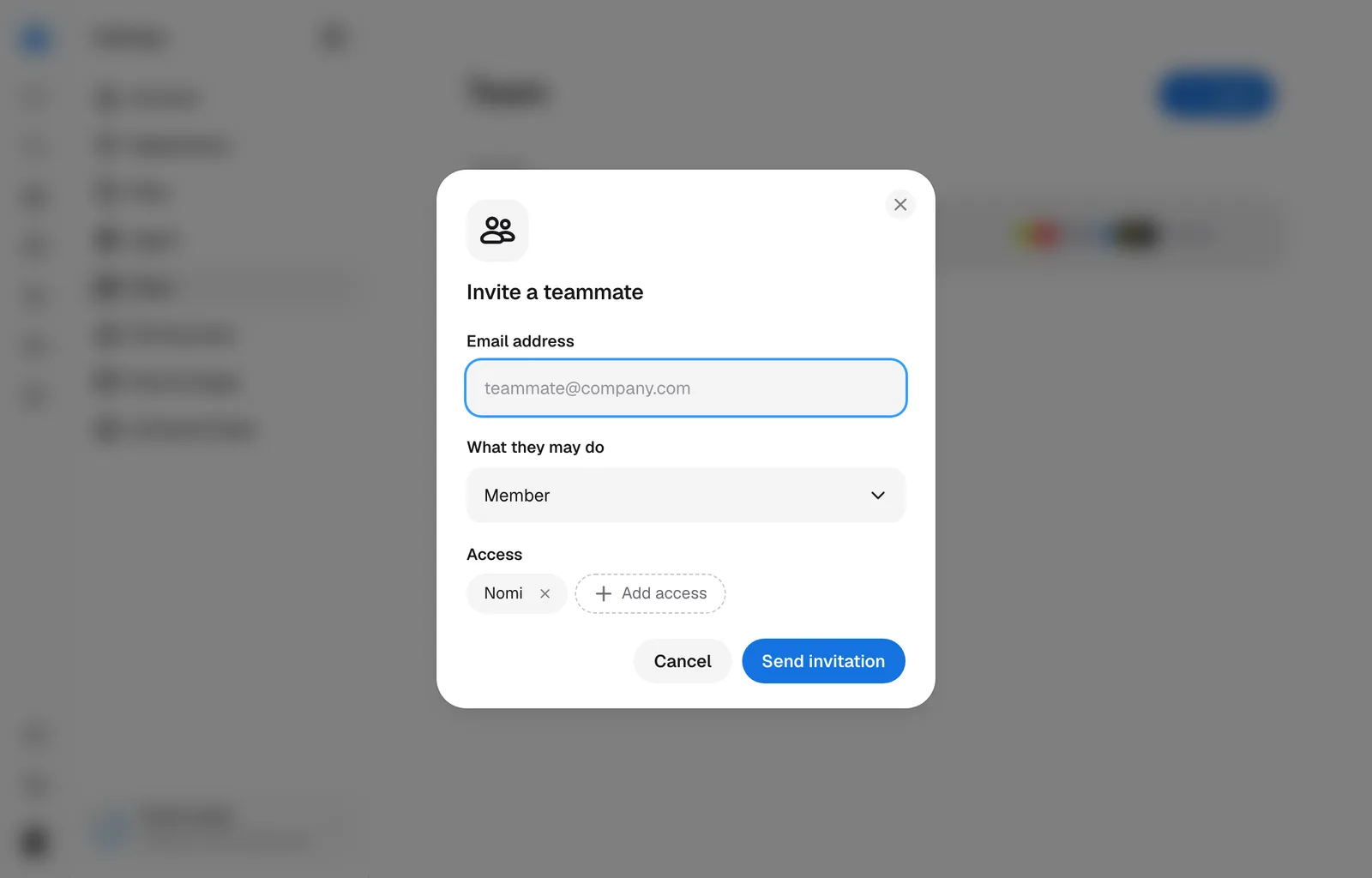 The invite dialog over Settings, Team.
